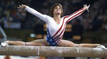 <p>Gymnast Mary Lou Retton competed in the 1984 Games with very little international experience, and became the first American to win all-around gold. Inspired by Nadia Comaneci, Retton scored a perfect-10 on the vault exercise that led to her victory. (Getty) </p>