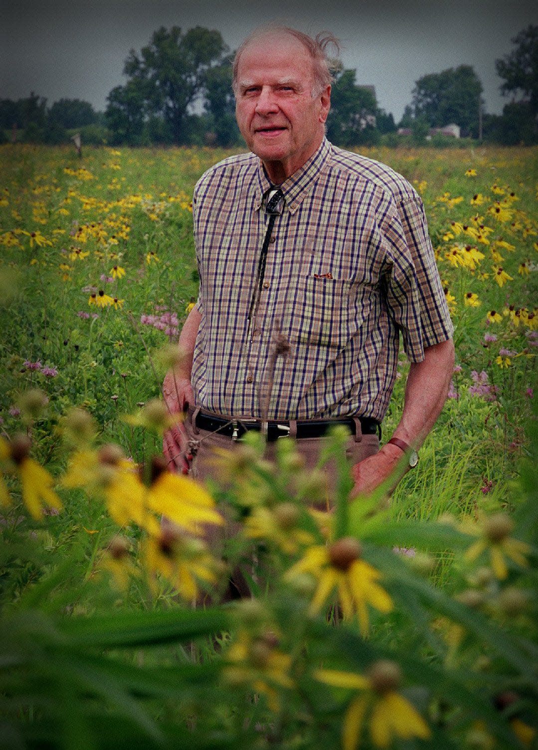 A July 2001 photo shows former Wisconsin governor and U.S senator Gaylord Nelson standing in a prairie of blooming wildflowers at Governor Nelson State Park. Nelson was interviewed about the condition of water 30 years after the clean water act was started. In 1995, President Clinton awarded Nelson the Presidential Medal of Freedom calling Nelson “the father of Earth Day.”