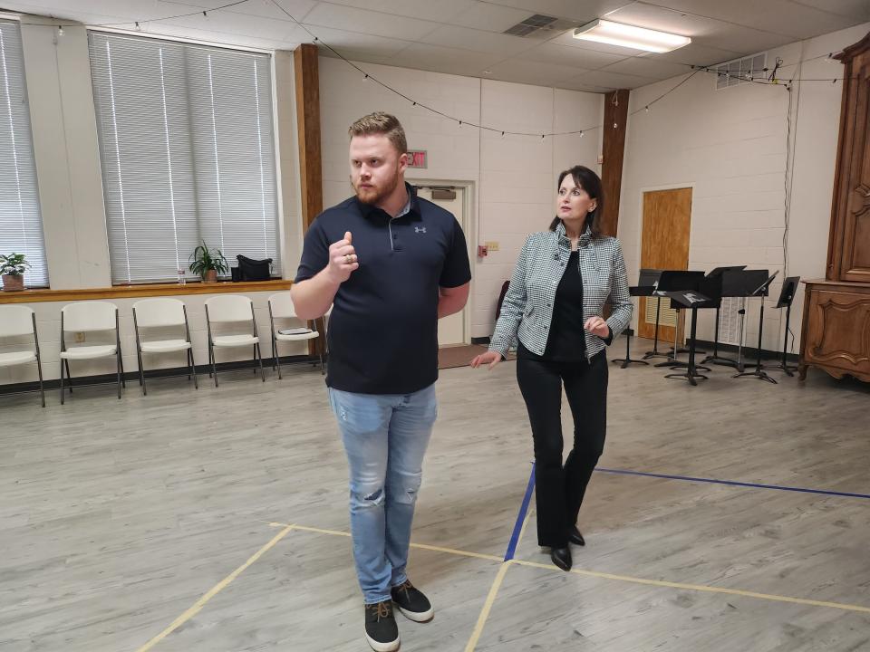 Amarillo Opera cast members Travis Hyman as Ceprano, left, and Katrina Perales as Countess Ceprano rehearse for the upcoming production of Verdi's "Rigoletto." The production will be held April 1 in the Globe-News Center for the Performing Arts.