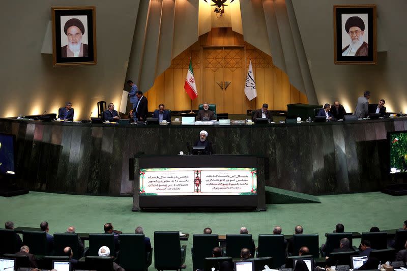 Iranian President Hassan Rouhani speaks during a session of parliament in Tehran