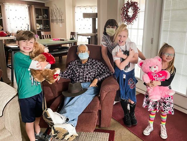 <p>Courtesy of Roxanna Flood</p> Roxanna Flood's kids with her father, Monway Ison, and mother, Ramona Ison