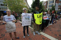 <p>Linda Schierow, from left, and Nancy Bundy, join other protesters outside the Alexandria Federal Courthouse in Alexandria, Va., Tuesday, July 31, 2018, on day one of Paul Manafort’s trial. (Photo: Manuel Balce Ceneta/AP) </p>