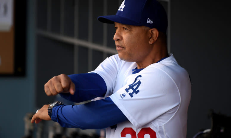 Dave Roberts sitting in the dugout.