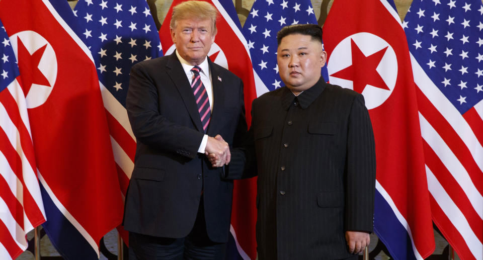 In this file photo from February, US President Donald Trump on the left poses with North Korean leader Kim Jong Un for a photo in Hanoi, Vietnam.