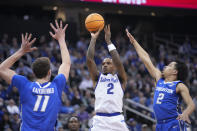 Seton Hall guard Al-Amir Dawes (2) goes to the basket against Creighton center Ryan Kalkbrenner (11) and guard Ryan Nembhard during the second half of an NCAA college basketball game, Wednesday, Feb. 8, 2023, in Newark, N.J. Creighton won 75-62. (AP Photo/Mary Altaffer)