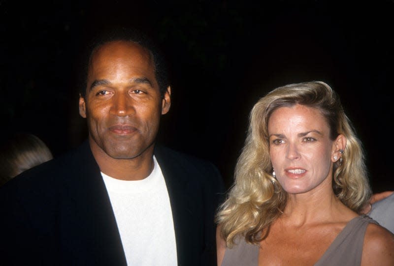 O.J. Simpson and Nicole Brown Simpson pose at the premiere of the “Naked Gun 33 1/3: The Final Isult” in which O.J. starred on March 16, 1994 in Los Angeles, California. - Photo: Vinnie Zuffante (Getty Images)