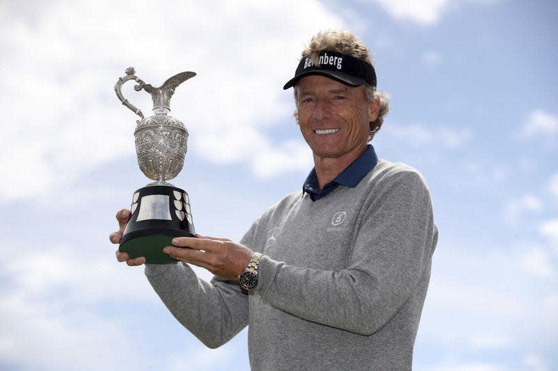 Germany’s Bernhard Langer poses with the trophy after winning the Senior Open at Royal Porthcawl Golf Club, Porthcawl, Wales, Sunday.PA via AP/NICK POTTS