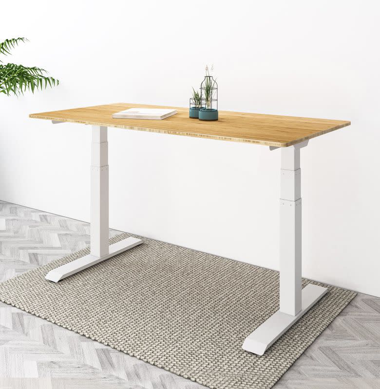 <p><a href="https://go.redirectingat.com?id=74968X1596630&url=https%3A%2F%2Fwww.flexispot.com%2Felectric-height-adjustable-desk-with-bamboo-top&sref=https%3A%2F%2Fwww.esquire.com%2Flifestyle%2Fg33806651%2Fbest-work-from-home-desks%2F" rel="nofollow noopener" target="_blank" data-ylk="slk:Shop Now;elm:context_link;itc:0;sec:content-canvas" class="link rapid-noclick-resp">Shop Now</a></p><p>Kana Bamboo Standing Desk</p><p>flexispot.com</p><p>$369.99</p>