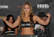 LAS VEGAS - NOVEMBER 17: Ronda Rousey on the scale at the Strikeforce Challengers weigh-in at Palms Hotel and Casino on November 17, 2011 in Las Vegas, Nevada. (Photo by Kari Hubert/Forza LLC/Forza LLC via Getty Images)