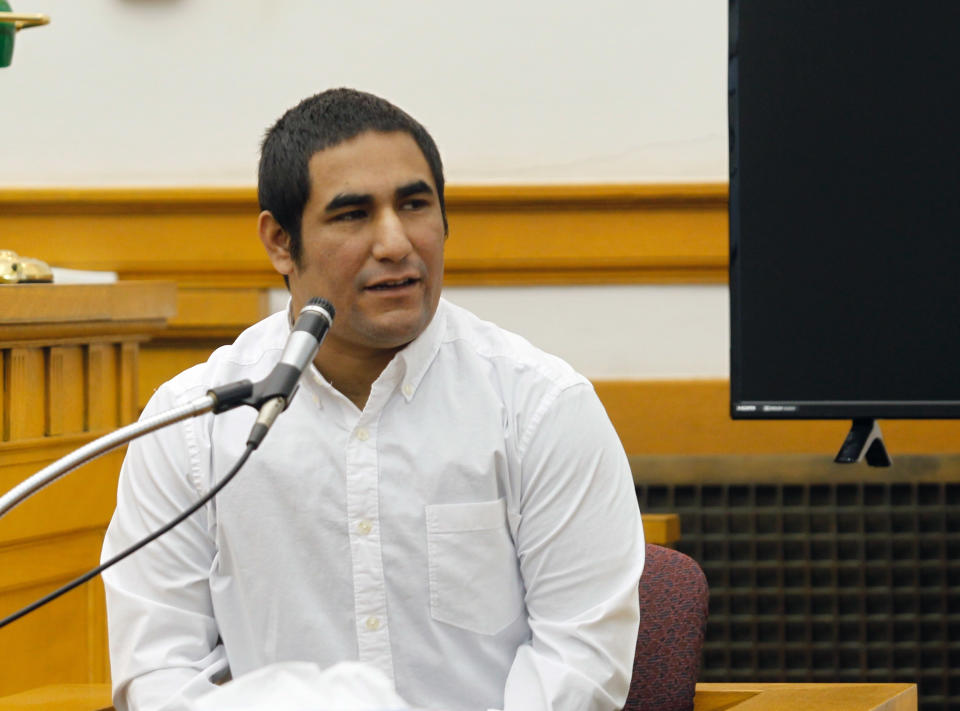 Zachary Koehn, 29, testifies, Friday Nov. 2, 2018 in Henry County District Court in Mount Pleasant, Iowa. Koehn on trial for murder in the gruesome death of his infant son has taken the stand in his own defense and blamed the baby's mother. (Jeff Reinitz/The Courier via AP)