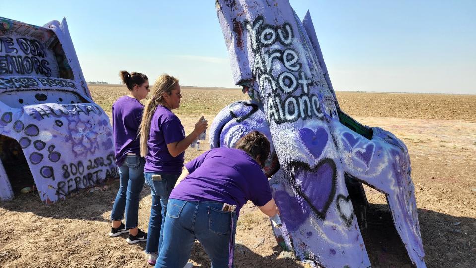 The Texas Department of Family and Protective Services held a “Paint Cadillac Ranch Purple” event in 2022. This year's event was cancelled due to weather.