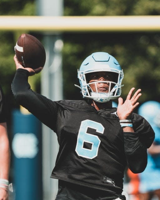 Jacolby Criswell throws during North Carolina football’s first preseason practice Friday in Chapel Hill.