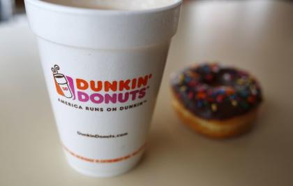 A drink and a doughnut are seen at a Dunkin' Donuts location in the Chicago suburb of Niles, Illinois, February 4, 2015. REUTERS/Jim Young