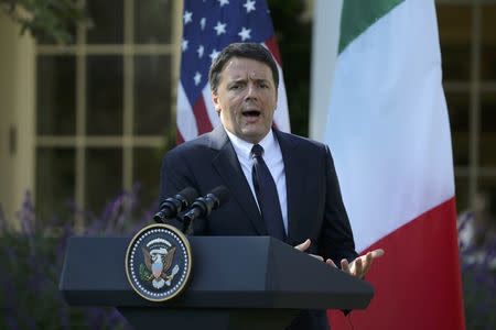 Italian Prime Minister Matteo Renzi speaks during a joint news conference with U.S. President Barack Obama in the Rose Garden of the White House in Washington, U.S., October 18, 2016. REUTERS/Carlos Barria