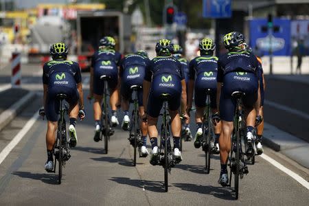 Movistar riders cycle during a team training session in Utrecht, Netherlands, July 3, 2015. REUTERS/Benoit Tessier