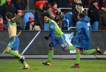 Dec 10, 2016; Toronto, Canada; Seattle Sounders defender Roman Torres (29) celebrates making the game winning penalty kick against the Toronto FC in the 2016 MLS Cup at BMO Field. Mandatory Credit: Mark J. Rebilas-USA TODAY Sports