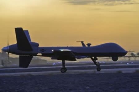 A MQ-9 Reaper drone taxis at Kandahar Airfield, Afghanistan in this December 27, 2009 photo. REUTERS/Efren Lopez/U.S. Air Force photo/Handout