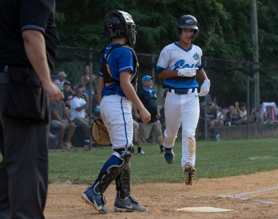 Toms River East Joey DiMeo crosses the plate for first run.  Toms River East Little League shuts out Sunnybrae 3-0 to win Section 3 Championship in Hamilton, NJ on July 23, 2021. 