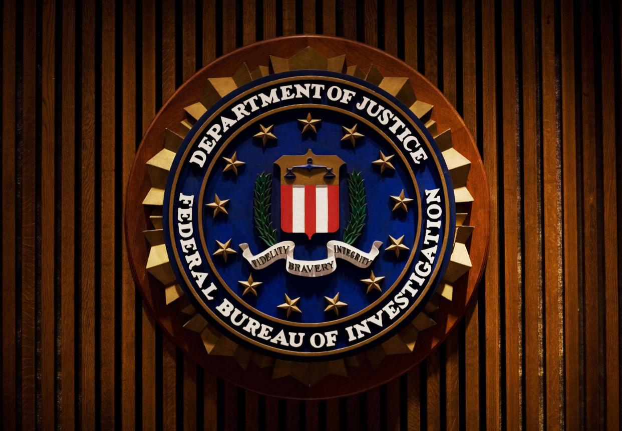 A crest of the Federal Bureau of Investigation is seen 03 August 2007 inside the J. Edgar Hoover FBI Building in Washington, DC.