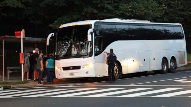 PHOTO: A group of mainly Venezuelan migrants, who were sent by bus from detention in Texas, are dropped off outside the Naval Observatory, the official residence of Vice President Kamala Harris in Washington, Sept. 17, 2022. (Marat Sadana/Reuters)