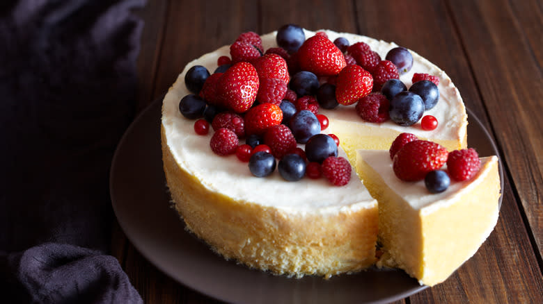 mixed berries on a cheesecake