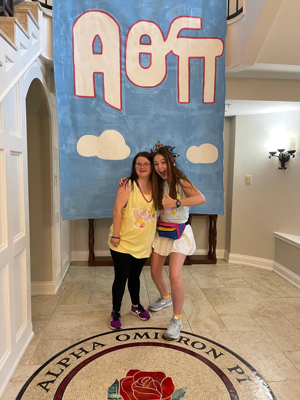 UT FUTURE student Elise McDaniel and UT FUTURE mentor Flora Mae Ayers pose for a photo on UT Bid Day at Alpha Omicron Pi in Knoxville, Tennessee.