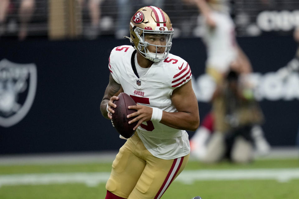 San Francisco 49ers quarterback Trey Lance (5) drops backs to pass against the Las Vegas Raiders during the first half of an NFL preseason football game, Sunday, Aug. 13, 2023, in Las Vegas. (AP Photo/John Locher)