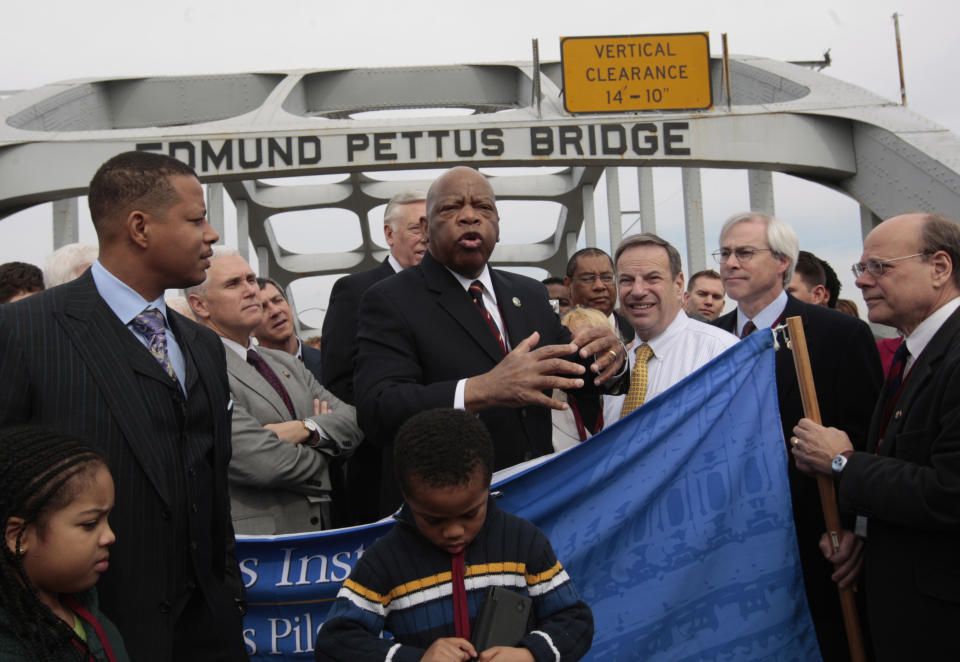 FILE - U.S. Rep. John Lewis, D-Ga., describes the events of Bloody Sunday during a visit to the Edmund Pettus Bridge in Selma, Ala., Sunday, March 7, 2010. The success of CNN's 'RBG' film two years ago, about the late Supreme Court Justice Ruth Bader Ginsburg, led the network on a search for a similar contemporary figure whose life could be examined in historical terms. CNN's Amy Entelis says that led them to Lewis, who died of cancer in July. The film "John Lewis: Good Trouble" will debut on CNN on Sunday night. (AP Photo/Dave Martin, File)