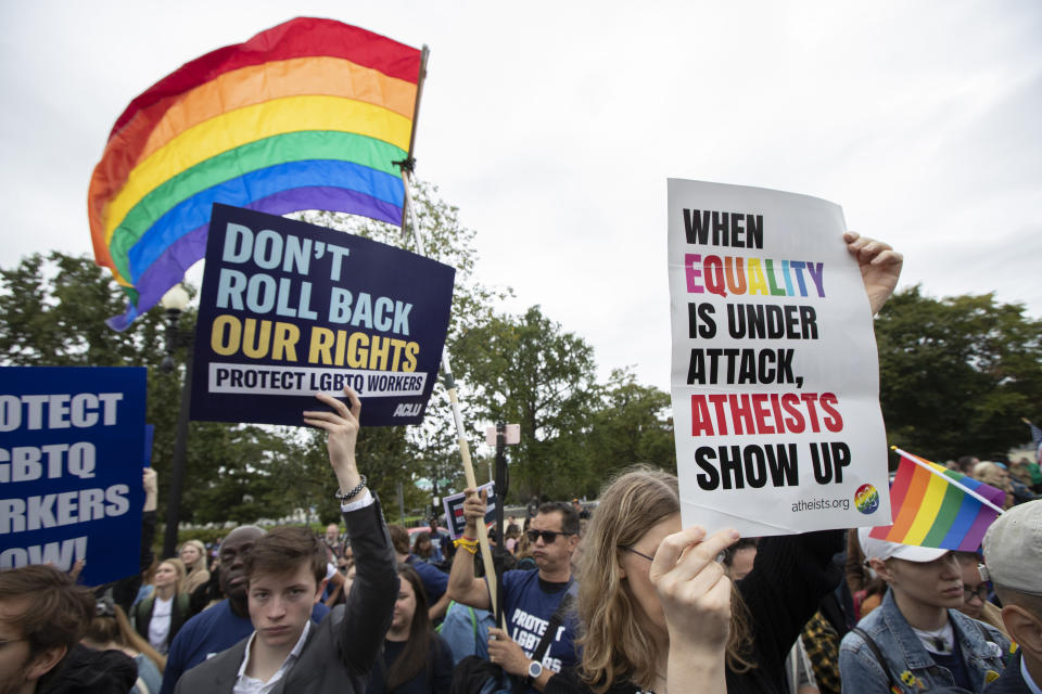 Supporters of the LGBT gather in front of the U.S. Supreme Court, Tuesday, Oct. 8, 2019, in Washington. The Supreme Court is set to hear arguments in its first cases on LGBT rights since the retirement of Justice Anthony Kennedy. Kennedy was a voice for gay rights while his successor, Brett Kavanaugh, is regarded as more conservative. (AP Photo/Manuel Balce Ceneta)