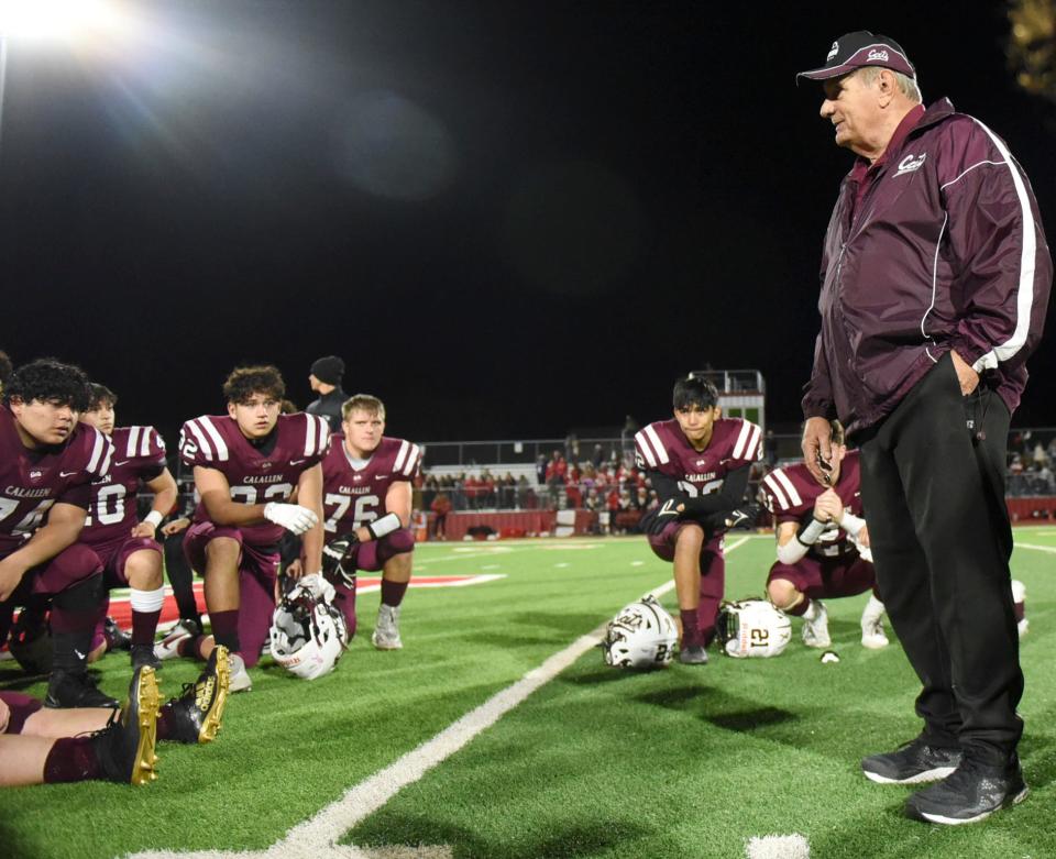 Calallen's head football coach Phil Danaher speaks to his team after the team's loss against Fredricksburg, Friday, Nov. 19, 2021, in Jourdanton. Fredricksburg won, 14-10.