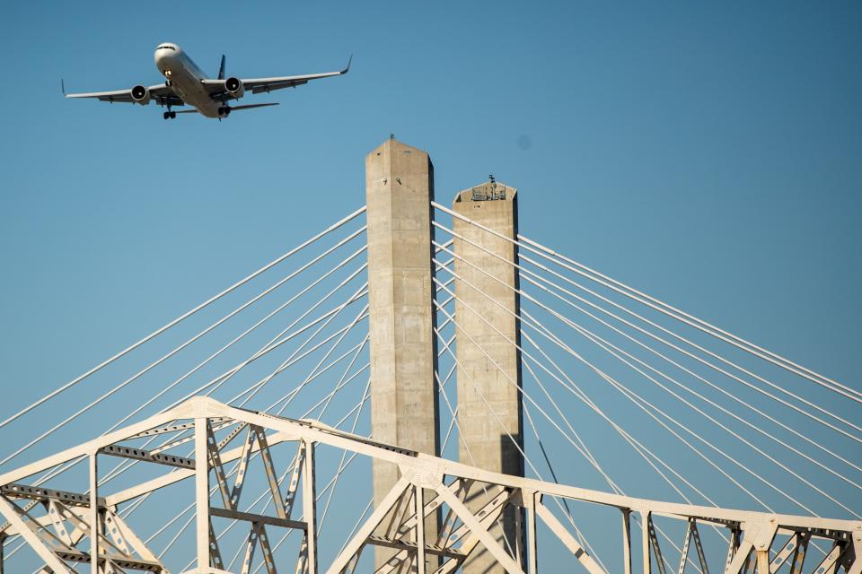 A UPS cargo plane flies over the Lewis and Clark bridge during the Thunder Over Louisville air show on Saturday at Waterfront Park. April 23, 2022