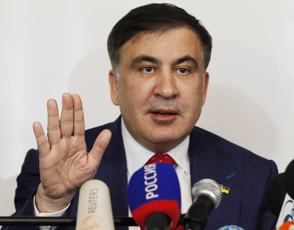 FILE - In this Tuesday, Feb. 13, 2018 file photo, Mikheil Saakashvili, former Georgian president-turned-Ukrainian opposition leader, speaks to reporters in Warsaw, Poland. Mikheil Saakashvili, the former president of Georgia, has been given his Ukrainian citizenship back by the country’s new president. Volodymyr Zelenskiy, the comedian who last week took power in Ukraine following his convincing election victory, signed a decree on Tuesday, May 28, 2019 that gave back Saakashvili his Ukrainian citizenship. (AP Photo/Czarek Sokolowski, file)