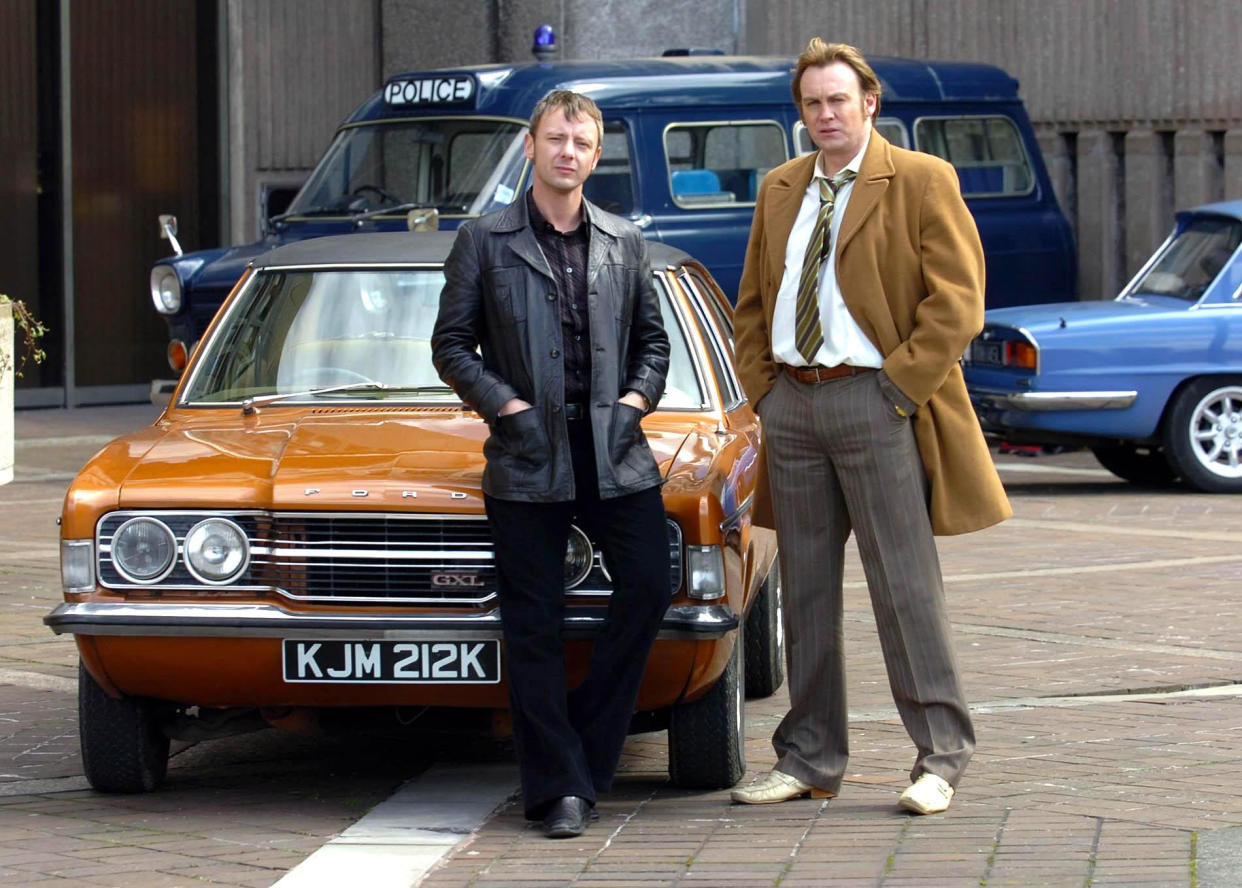 John Simm (L) and Philip Glenister at the Booth Street Film Depot in Stockport.   (Photo by Neil Jones - PA Images/PA Images via Getty Images)