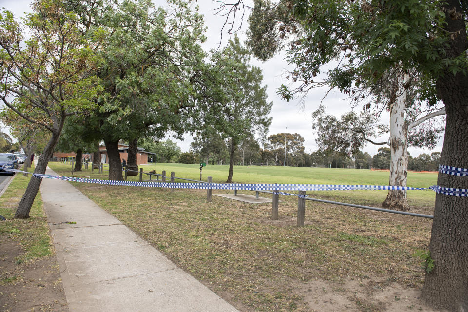 The Melbourne park with police tape around it. 