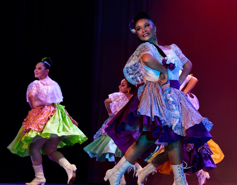 Ballet Folklorico dancers kick up their heels during the Aug. 21 performance at the Paramount Theatre. The St. Vincent Pallotti Catholic Church troupe was formed in 1963.