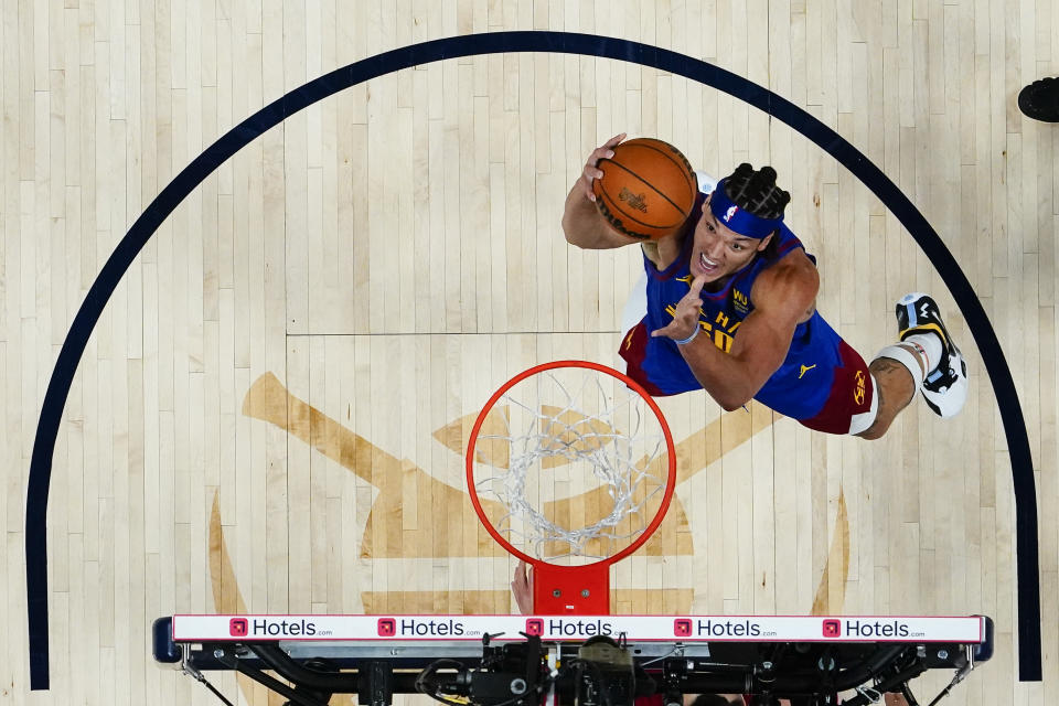 Denver Nuggets forward Aaron Gordon shoots against the Miami Heat during the first half of Game 1 of basketball's NBA Finals, Thursday, June 1, 2023, in Denver. (AP Photo/Jack Dempsey, Pool)