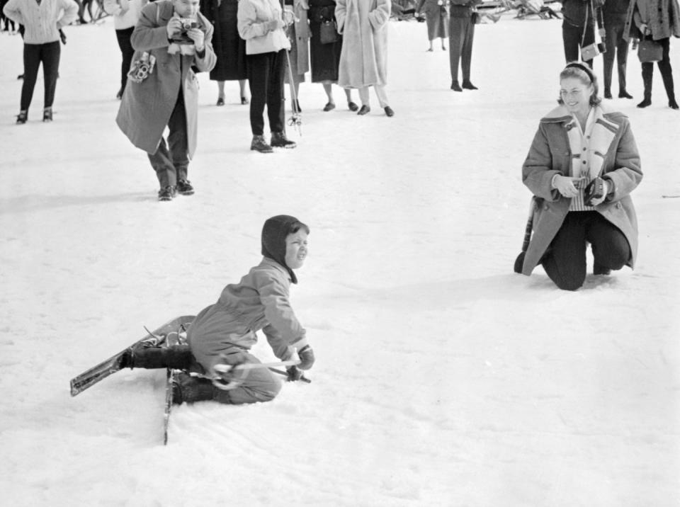 <p>Ingrid Bergman and her daughter, now famous actress Isabella Rossellini, play in the snow while spending Christmas in Sun Valley, Idaho. </p>