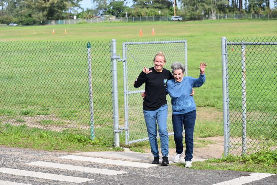 Marge Wardenski (right) leaves the airfield with granddaughter Chelsea Rorer after they went skydiving to celebrate her impending 95th birthday.