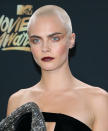 <p>Cara Delevingne’s platinum blond, almost-bald head has been stealing the scene from her popular brows lately. (Photo: JB Lacroix/WireImage) </p>