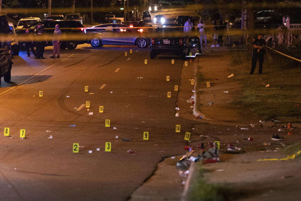 This image, courtesy of News 5 Cleveland, shows officers of the Akron Police Department working on the scene of a shooting that happened overnight in Akron, Ohio, Sunday, June 2, 2024. (Mike Vielhaber/News 5 Cleveland via AP)