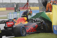 Red Bull driver Sergio Perez of Mexico gets out of his car after crashing on his way to the grid during the Formula One Grand Prix at the Spa-Francorchamps racetrack in Spa, Belgium, Sunday, Aug. 29, 2021. (AP Photo/Olivier Matthys)