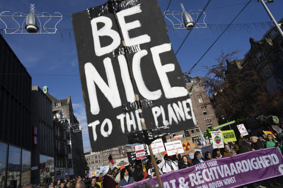 Thousands of people marched through Amsterdam, Netherlands, Sunday, Nov. 12, 2023, to call for more action to tackle climate change. Activist Greta Thunberg was among the speakers at the march that comes 10 days before national elections in the Netherlands. (AP Photo/Peter Dejong)