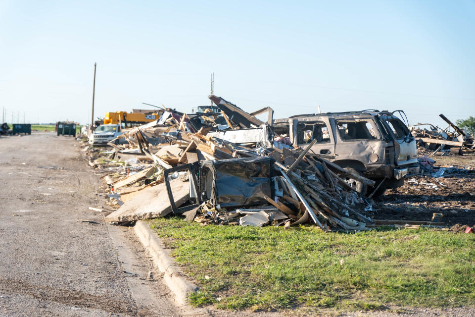 A row of debris from destroyed homes in Perryton from Thursday's tornado.