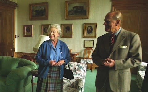 Queen Elizabeth II and the Duke of Edinburgh wait to receive the President of Malta, Dr Edward Fenech-Adami and his wife, Mary at Balmoral Castle - Credit: David Cheskin/PA