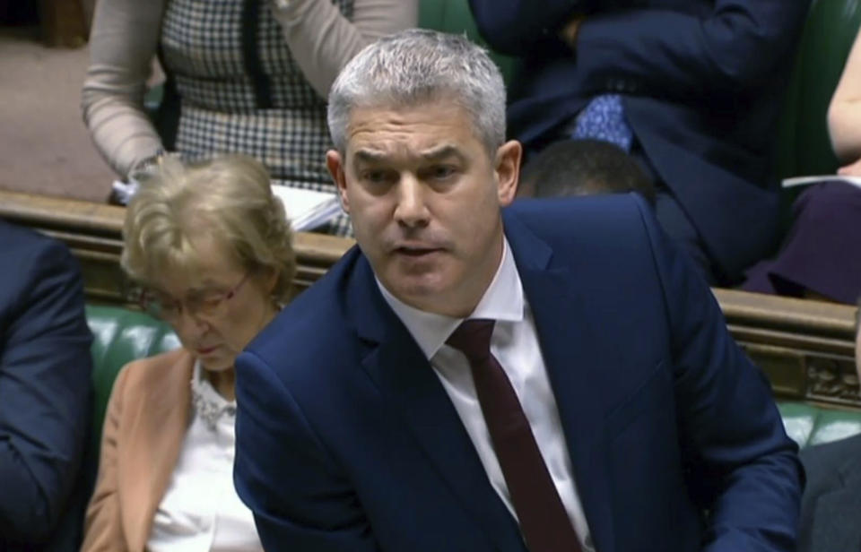 Brexit Secretary Stephen Barclay speaks to lawmakers in the House of Commons ahead of a Brexit vote, in London, Thursday Feb. 14, 2019. Barclay told lawmakers that "the only way to avoid ‘no-deal’ is either to secure a deal on the terms the prime minister has set out” or to cancel Brexit - something the government says it won’t do. (House of Commons TV via AP)