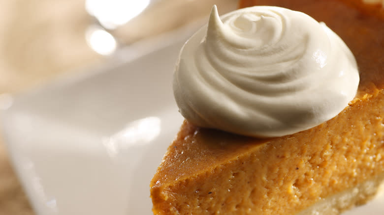 pumpkin pie with whipped cream