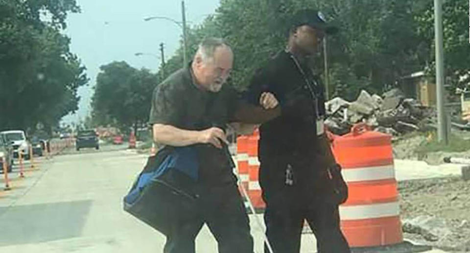 Mr Turner slowed down traffic and made sure Mr Hubbard made it across the road safely. Source: Milwaukee County Transit System