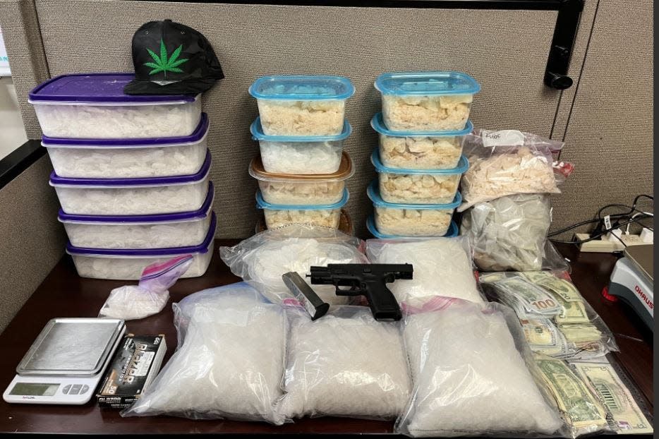 Police announced these drugs, cash and a gun were seized in Athens after an investigation.