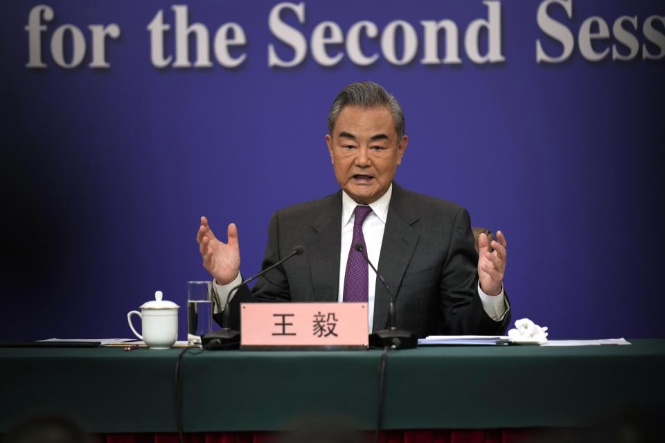 Chinese Foreign Minister Wang Yi speaks during a press conference on the sideline of the National People's Congress in Beijing, Thursday, March 7, 2024. (AP Photo/Ng Han Guan)