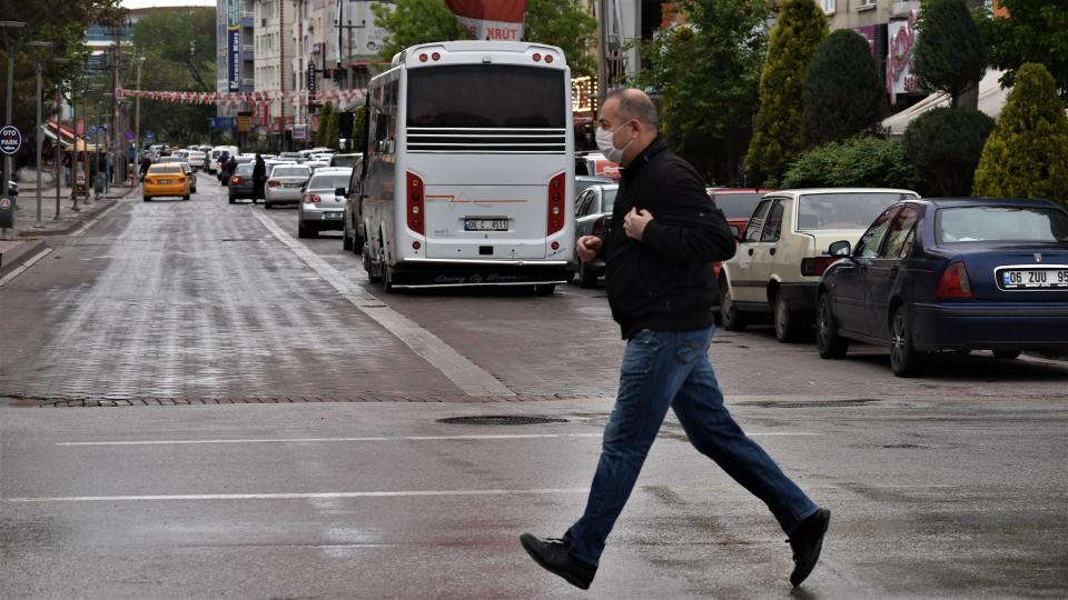 ANKARA, TURKEY - MAY 7, 2020: A man wearing a protective face mask walks across a street in Sincan district amid the coronavirus COVID-19 outbreak.- PHOTOGRAPH BY Altan Gocher / Barcroft Studios / Future Publishing (Photo credit should read Altan Gocher/Barcroft Media via Getty Images)